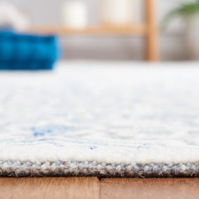 Hand-Tufted Blue and Ivory Wool 3'x5' Area Rug