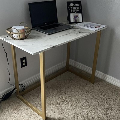 Cute white store and gold desk