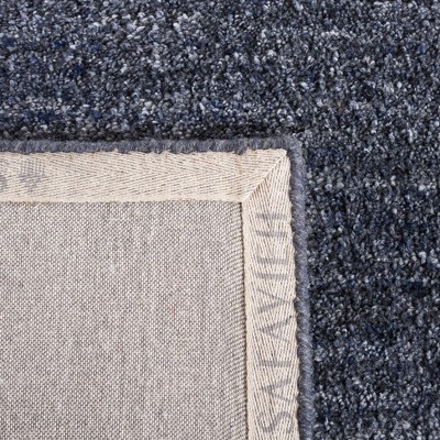 Handmade Black Wool 6' x 9' Tufted Area Rug