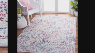 Ivory and Navy 8' x 10' Synthetic Washable Reversible Area Rug