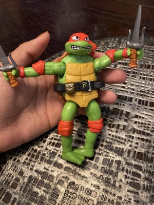 Teenage Mutant Ninja Turtles: Mutant Mayhem 5.5 Raphael Deluxe Ninja Shouts Figure by Playmates Toys