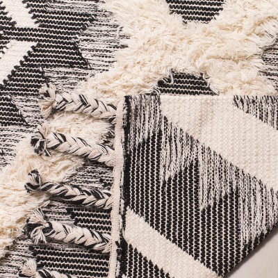 Kenya Hand-Knotted Black and Ivory Wool Rug
