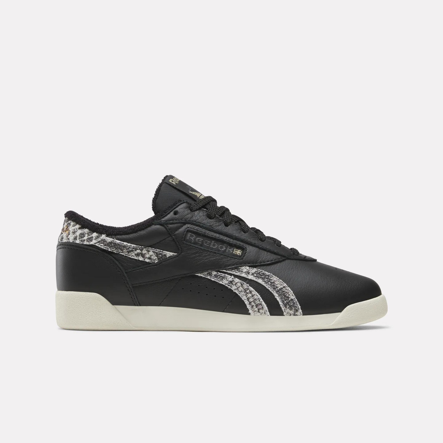 Женские кроссовки Reebok Freestyle Lo Shoes Size 8.5 ALMOSTBLACK/VINTAGECHALK/REEBOKLIGHTGOLD — фото 1