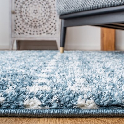 Square Blue and Ivory Synthetic Shag Area Rug