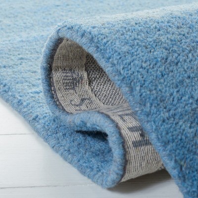 Handmade Coastal Blue Solid Wool Rectangular Accent Rug