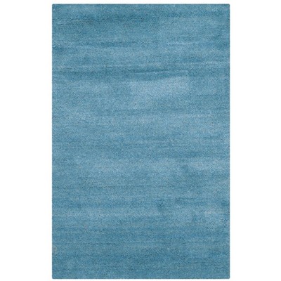 Handmade Coastal Blue Solid Wool Rectangular Accent Rug