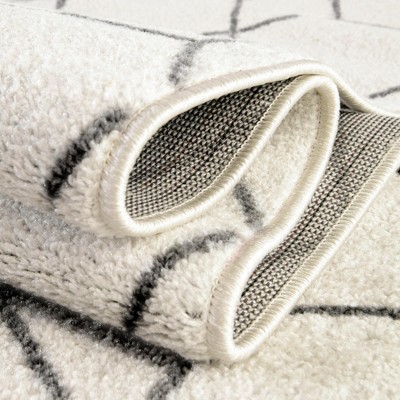 Ivory Rectangular Synthetic Trellis Area Rug 7' x 10'