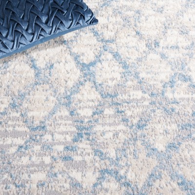 Ivory Abstract 5' x 7' Hand-Knotted Synthetic Area Rug