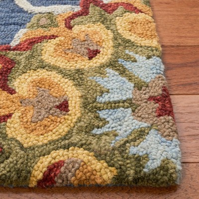 Handmade Blue Wool Floral 6' x 9' Area Rug