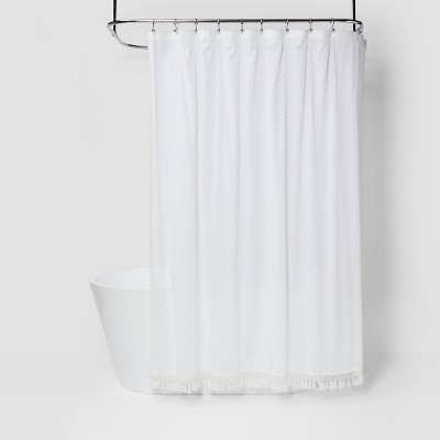 white and beige shower curtain