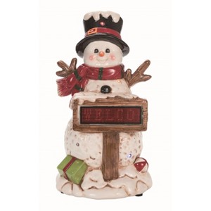 Transpac Dolomite 10.75 in. Multicolor Christmas Light Up Music Snowman with Sign - 1 of 2
