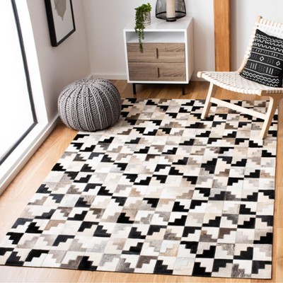 Ivory and Black Geometric Cowhide Patchwork Area Rug 8' x 10'