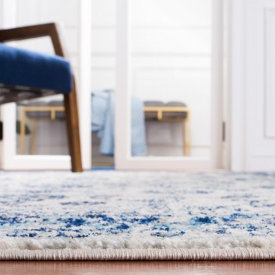 Ivory and Blue Hand-Knotted Round Synthetic Area Rug