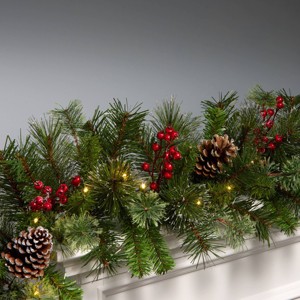 National Tree Company 9' Prelit LED Iced Berry Pine Artificial Garland with Red Berries 50 Warm White Battery Operated - 1 of 3