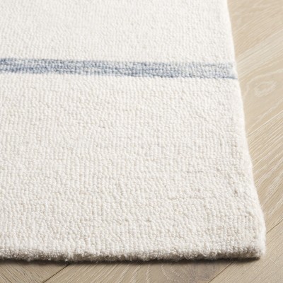 Ebony EBN951 Handmade Tufted Rug - Safavieh