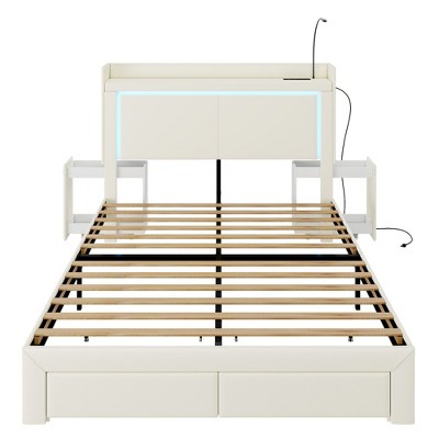 Vlsrka Queen Bed with LED lights and charging station, upholstered headboard with drawers, nightstand, and reading lamp.