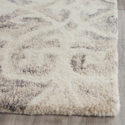 Off-White Handmade Wool Tufted Rectangular 6' x 9' Area Rug