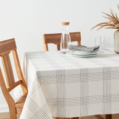 84" x 60" Off-White and Black Cotton Recycled Polyester Plaid Tablecloth