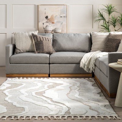 Ivory and Beige Abstract High-Low Tasseled 6'7" x 9' Area Rug