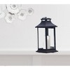 HomeRoots Set of Two Black Distressed Plastic Floor Lantern Candle Holders With Candle - 2 of 3