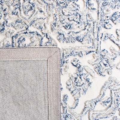 Ivory and Blue Hand-Tufted Wool Area Rug, 5' x 8'
