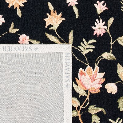 Handmade Black Floral Wool Accent Rug