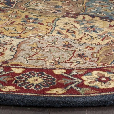 Oval Multi/Navy Hand-Tufted Wool Area Rug 4'6" x 6'6"