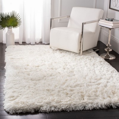 Ivory Hand-Tufted Shag Sheepskin 4' x 6' Area Rug