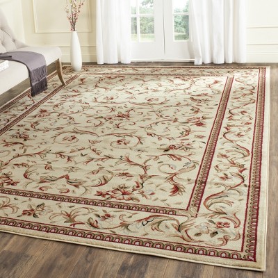 Ivory Floral Tufted Reversible Synthetic 9' x 12' Area Rug