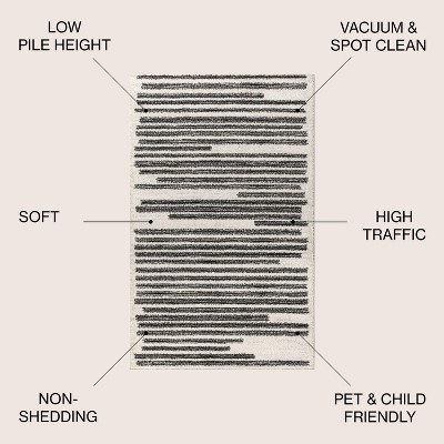 Khalil 8' x 10' Black and Cream Synthetic Stripe Rug