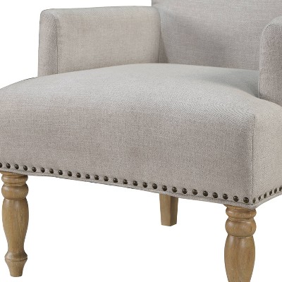 Beige Upholstered Accent Chair with Nailhead Trim and Wood Legs