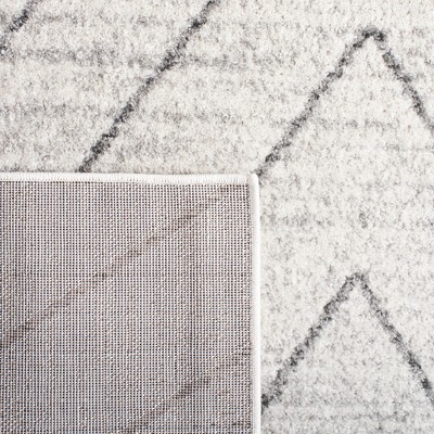 Rustic Lodge Chic Red & Beige Synthetic Area Rug - 5'1" x 7'6"