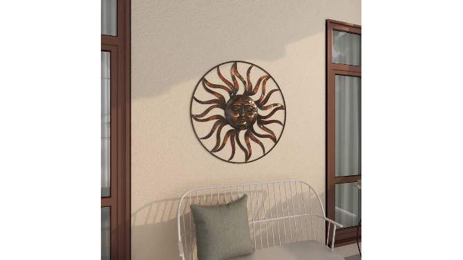 Metal Sunburst Indoor Outdoor Round Wall Decor with Distressed Copper Like Finish Brown - Olivia &#38; May, 2 of 29, play video