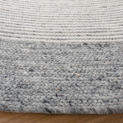 Handmade Grey and Ivory Round Wool Braided Rug, 5' Diameter