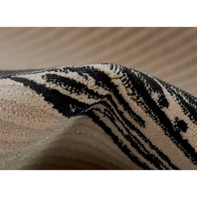 Xander Black and Ivory Geometric Synthetic Rug 2' x 3'