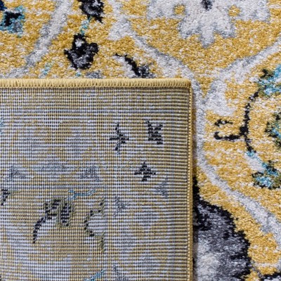 Gold and Ivory 8' x 10' Synthetic Reversible Area Rug