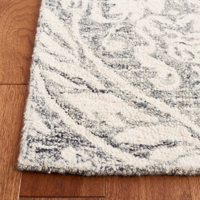 Ivory and Grey Abstract Handmade Wool 6' x 9' Area Rug