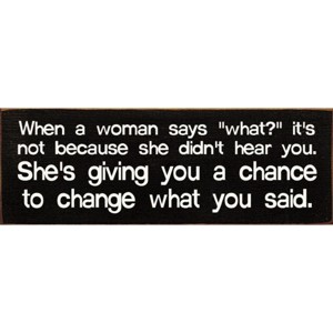 Slickblue When a Woman Says What Sign, 3.5x10 Funny Relationship Quote Plaque, Rustic Knotty Pine Wall or Shelf Decor - 1 of 3