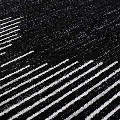 Black and White 5' x 7' Bohemian Stripe Synthetic Area Rug