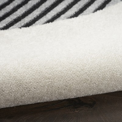 Ivory & Black Geometric Synthetic 6' x 9' Easy-Care Rug