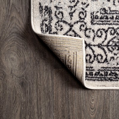 Black and White Filigree 4' x 6' Synthetic Area Rug