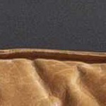 beige, dark plum, tan, rust, teal, green