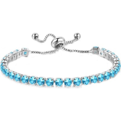 white gold + light blue stone