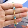 RMZ GOLD NYC 18K GOLD FILLED HIGH POLISH FINSH AQUAMARINE OVAL CRYSTAL ANKLE BRACELET - 2 of 3