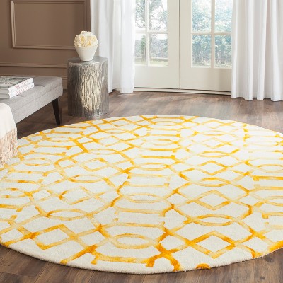 Ivory and Gold Round Hand-Tufted Wool Area Rug, 7'