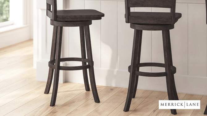 Merrick Lane 30" Classic Wooden Ladderback Swivel Bar Height Stool with Upholstered Padded Seat and Integrated Footrest, 2 of 13, play video