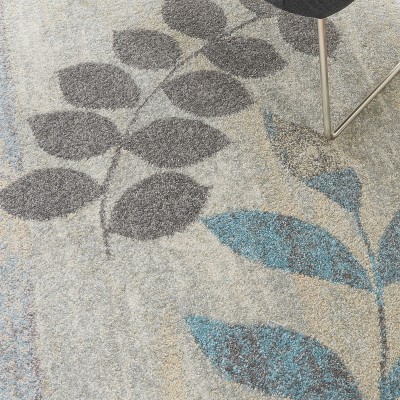 Ivory and Light Blue Floral Synthetic 5' x 7' Area Rug