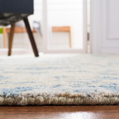 Hand Tufted Silver and Blue Wool Floral Area Rug - 5' x 8'