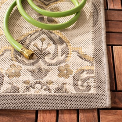 Beige Rectangular Easy Care 5' x 7' Synthetic Area Rug