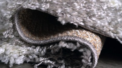 4' x 6' Grey and Ivory Synthetic Shag Area Rug